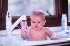 Baby taking a bath; Size=240 pixels wide